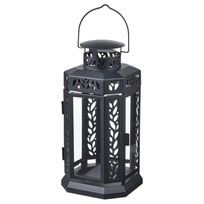 Black ENRUM lantern with leaf designs, suitable indoor/outdoor use, metal & glass, with powder-coated handle & base.