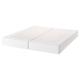 A white ESPEVÄR mattress base, rectangular, with two parts, made of pine and polyester.