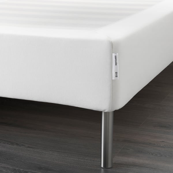 Hildegarde white bed base with metal legs, designed to elevate and support mattresses.
