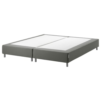 Gray upholstered bed base with metal legs.