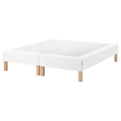 White ESPEVÄR bed base with wooden legs.