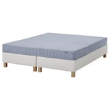 ESPEVÄR/VADSÖ: white bed frame with blue mattress. Modern, sleek design. Bonnell springs for support. Ready for a comfortable sleep.