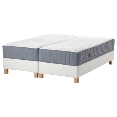 ESPEVÄR/VÅGSTRANDA mattress set: twin blue-grey mattresses on white base, light wooden legs, comfy quilted tops.