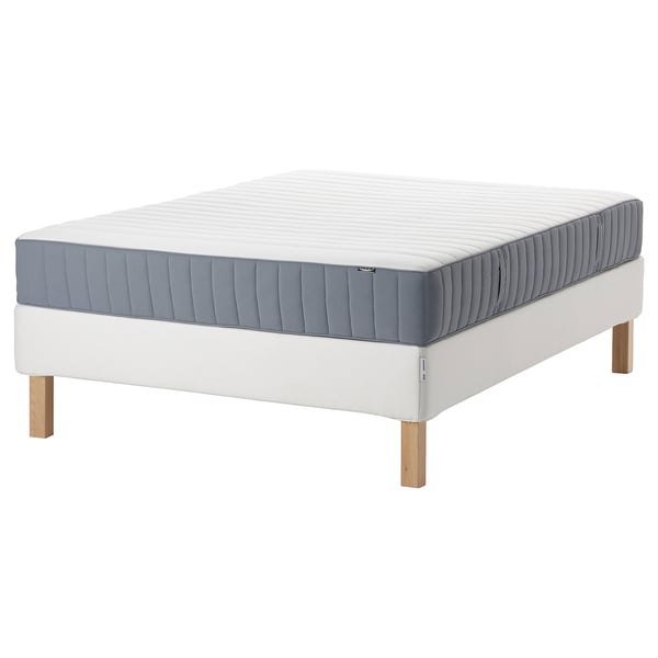White espevar/valevag mattress on white oak-leg base, rectangular, modern design.