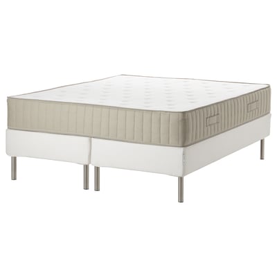 A white ESPEVÄR/VATNESTRÖM bed with a pocket sprung mattress. Modern design with stainless steel legs.