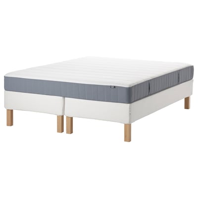 White king mattress and base; wooden legs; gray trim.