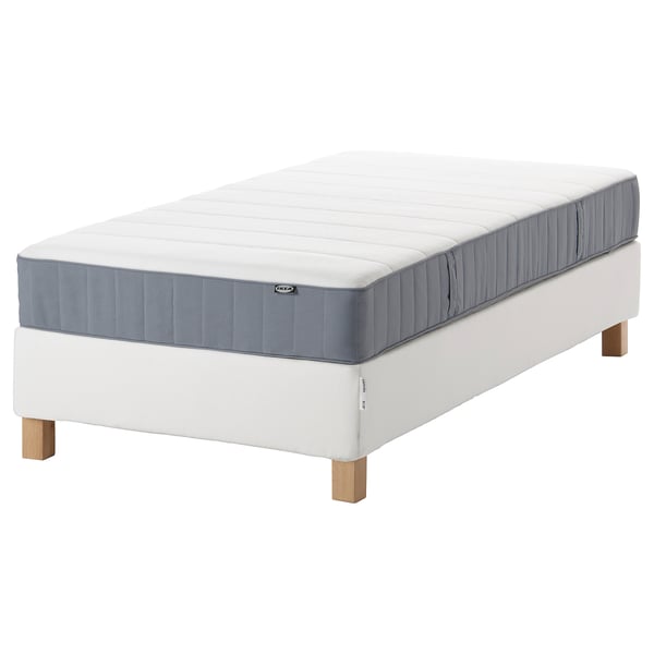 IKEA ESPEVÄR/VESTERÖY bed: white, fabric, rectangular, pocket spring mattress on wooden base with handles.