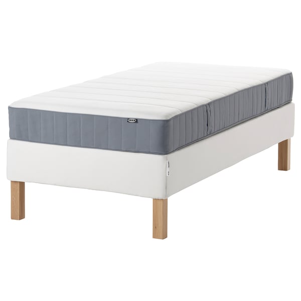ESPEVÄR/VESTERÖY twin mattress on white bed frame, rectangular with wooden legs, soft fabric design.