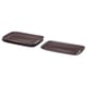 Four dark brown rectangular stoneware plates, glossy finish, stacked neatly.