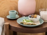 Breakfast on FÄRGKLAR green side plate, included yogurt bowl, cup, glass.