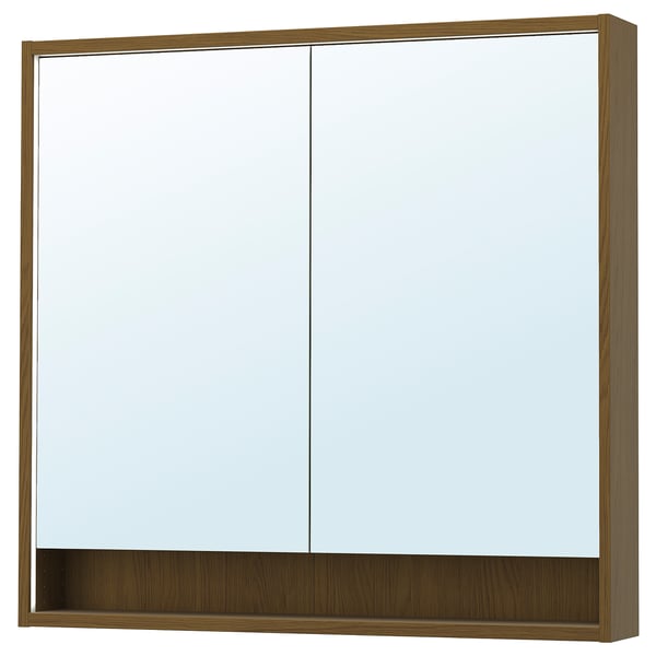 Faxelves mirror cabinet in warm wood tone, rectangular, with integrated lighting.