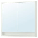 Depicts a white FAXÄLVEN mirror cabinet with built-in lighting, two doors, and an open shelf underneath.