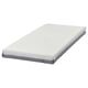 A white FEMTÅSEN mattress with grey edges, rectangular, and medium-firm, featuring a pocket spring core and foam layer for comfort.