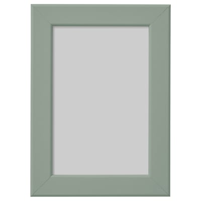 A FISKBO picture frame in green, rectangular, made of fiberboard, with plastic front protection.