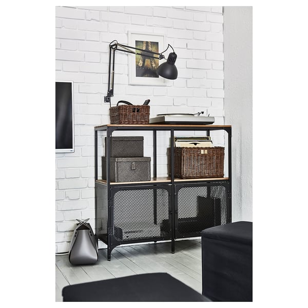 Modern industrial storage shelf, featuring metal grid, wooden shelves, and adjustable wall lamp.