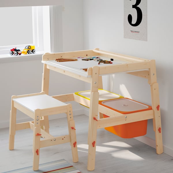 FLISAT kids desk and chair set in natural wood with white and colorful buckets. Small, adjustable, and perfect for playrooms.