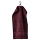 Dark maroon FREDRIKSJÖN cotton towel with ribbed edges hanging.