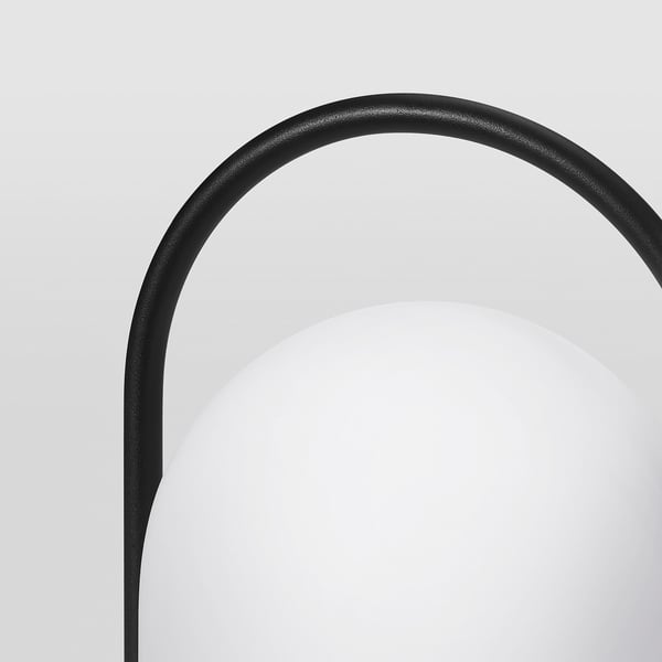 Sure, heres a concise and descriptive for elegant black arched lamp, sleek design, smooth finish.