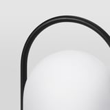 Sure, heres a concise and descriptive for elegant black arched lamp, sleek design, smooth finish.