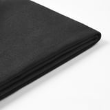 Black fabric folded neatly, showcasing smooth texture and precise stitching, ideal for outdoor cushion cover.