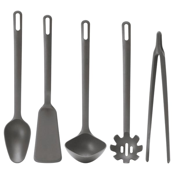 Six gray kitchen utensils: spoon, spatula, ladle, slotted spoon, tongs, and fork. Durable, non-stick, black plastic handles.