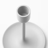 Modern grey candlestick, smooth texture, tapered design.