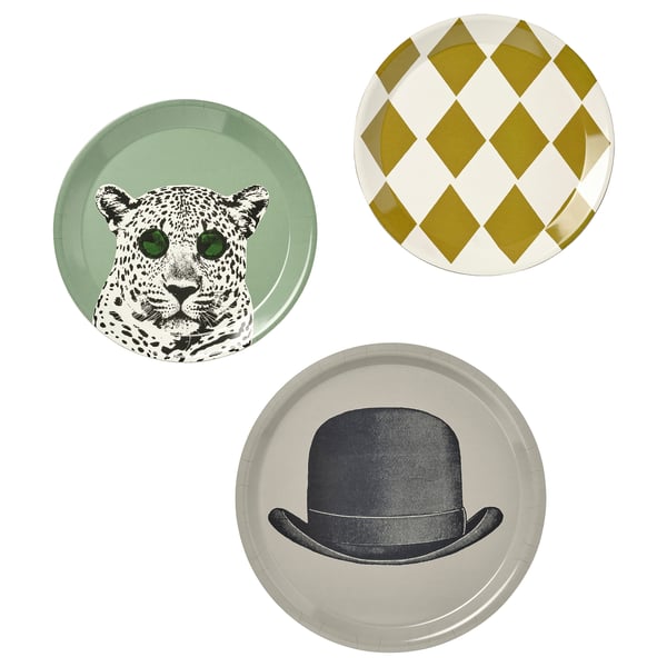 Three decorative plates: leopard, harlequin pattern, top hat. Green, gold, beige. Round. Fordable, stylish design.