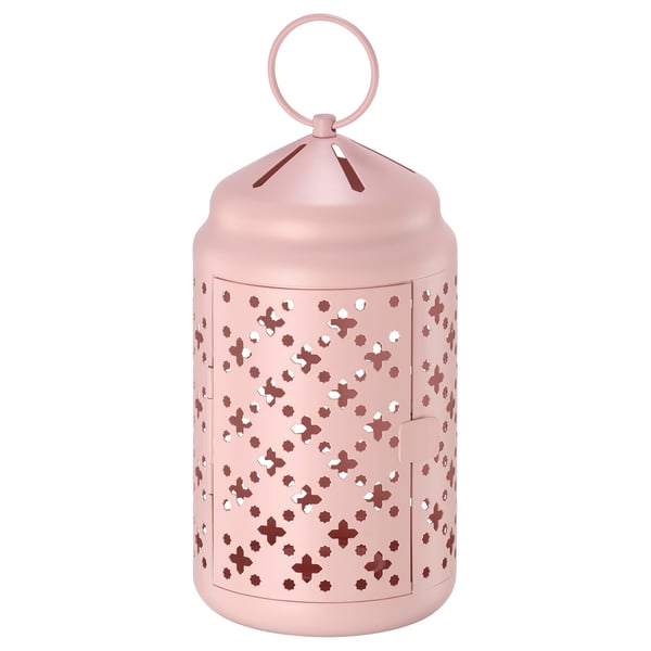 Light pink GOKVÄLLÅ lantern, round, with floral cutouts, metal, top loop handle, warm glow.