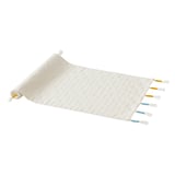 A gokvållå cream table runner with gold stripes, featuring handmade tassels in blue and orange. Made of cotton and polyester.