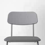 A modern gray chair with a sleek metal frame, cushioned seat for comfort, and a minimalist design.
