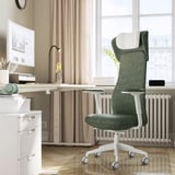GRÖNFJÄLL green chair in home office with desk and computer.