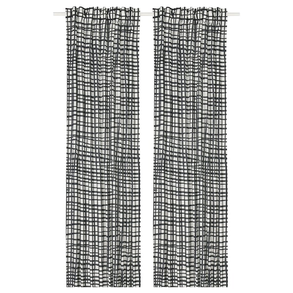 Pair of GRÖNKATTFOT black striped white curtains hanging. Rectangular, striped, opaque.