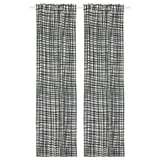 Pair of GRÖNKATTFOT black striped white curtains hanging. Rectangular, striped, opaque.