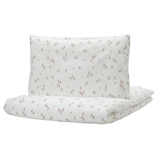 White GULDVÄVARE baby bedding with pink flowers, organic cotton duvet and pillowcase.