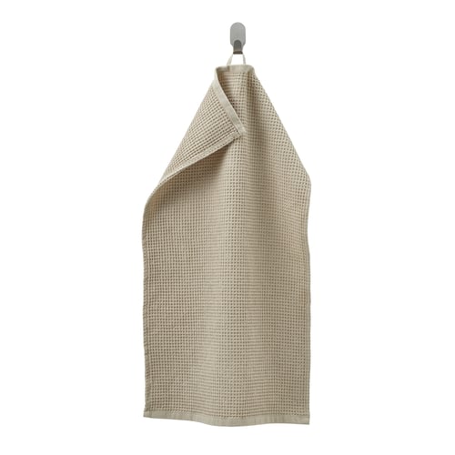 GULLDYNA, beige waffle towel, hanging on hook, 100% cotton, rectangular.