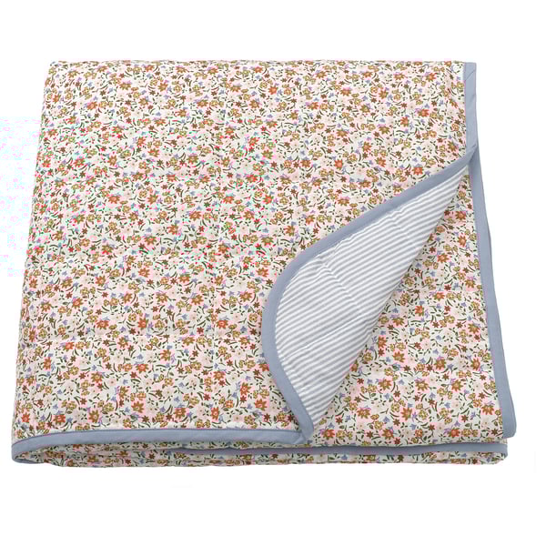 Floral bedspread with stripes, blue and white, folded, recycled polyester.