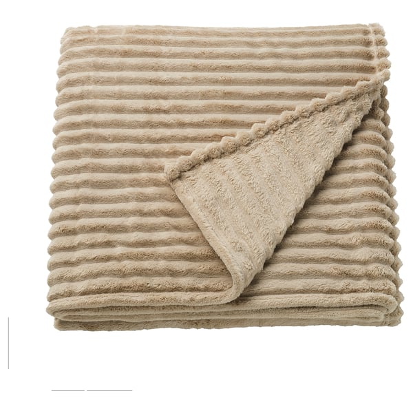 Ikea GULLSTRÅLE, soft beige blanket folded, horizontal stripes, plush texture, neatly arranged.