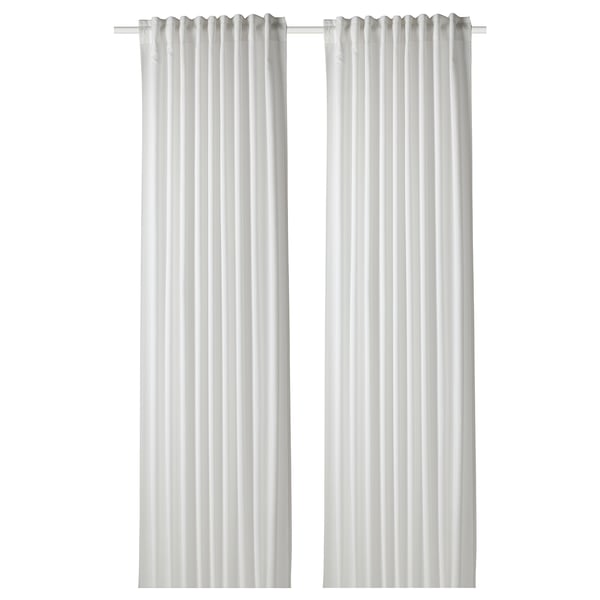Two white GUNNLAUG curtains hang side by side. They feature a textured, sound-absorbing fabric design, ideal for light filtering and noise reduction.