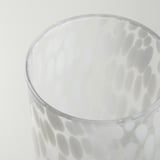 White textured glass vase, sleek and modern design, for holding flowers or displayed alone.