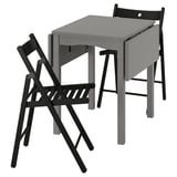 Gray HAUGA drop-leaf table with 2 foldable black frösvi chairs.