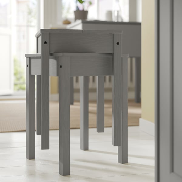 Gray HAUGA drop-leaf tables and stools in minimalist space. Modern, light wood, space-saving.