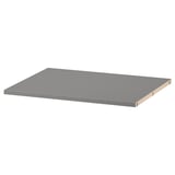 This image shows a single, rectangular HAUGA shelf in gray. Its flat and made from particleboard and acrylic paint, with plastic edging.