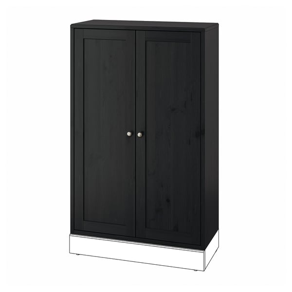 Dark brown HAVSTA wooden cabinet, rectangular, with two doors and circular knobs.