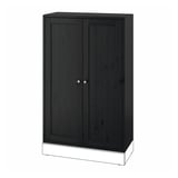 Dark brown HAVSTA wooden cabinet, rectangular, with two doors and circular knobs.