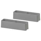 Two grey, rectangular, plastic HEJNE post caps. They are designed to protect post ends.
