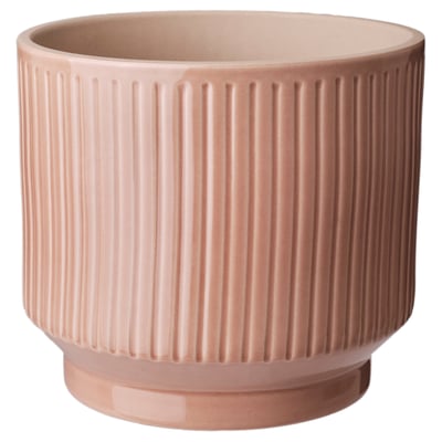 This image shows a HONUNGSPALM planter in pastel pink with vertical ribbing, made of stoneware, featuring a soft tactile pattern.