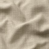 Close-up of textured fabric, likely furniture cover, showcasing intricate weave and light shade variations.