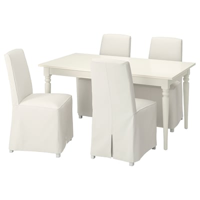 White dining set with square table and four matching chairs, wooden legs, upholstered seats.