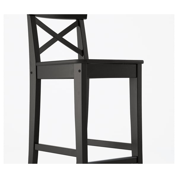 Wooden chair, angled back, wide seat, durable, comfy.