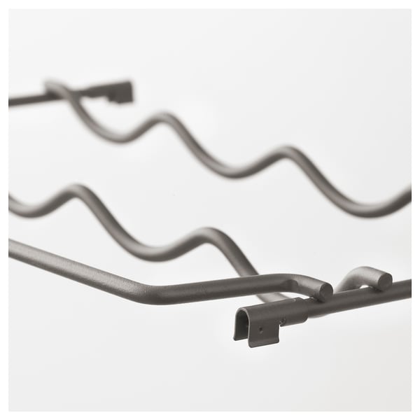 Close-up of IVAR storage system hooks, showcasing their durable, powder-coated metal construction.